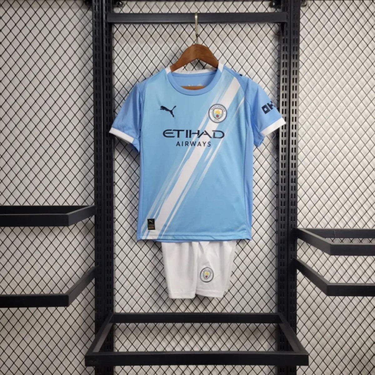 Conjunto Niño Manchester City temporada 25/26 Primera equipación