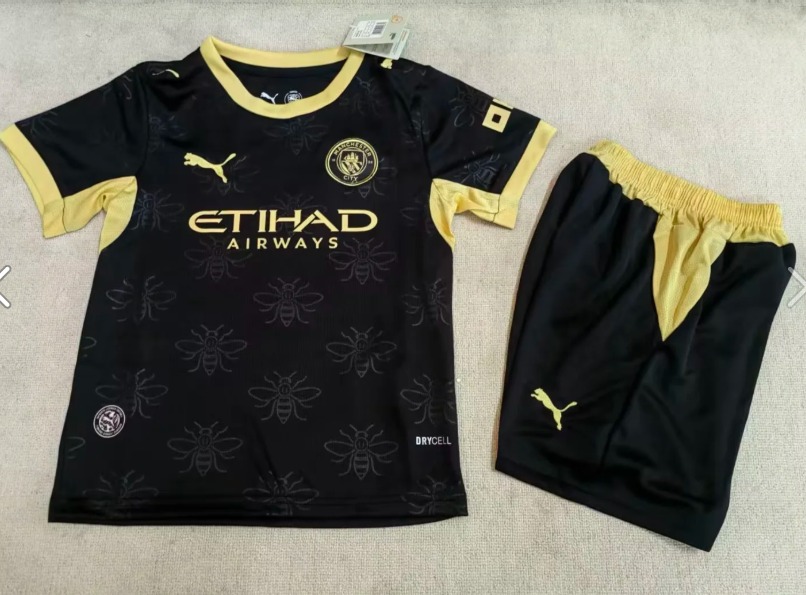 Conjunto Niño Manchester City temporada 26/27 Segunda equipación