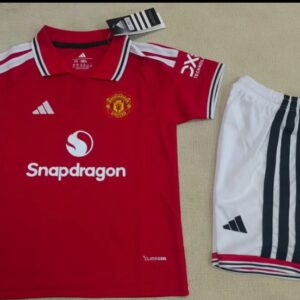 Conjunto Niño Manchester United temporada 26/27 Primera equipación