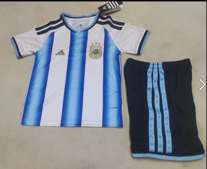CONJUNTO NIÑO ARGENTINA TEMPORADA 2026 PRIMERA EQUIPACIÓN